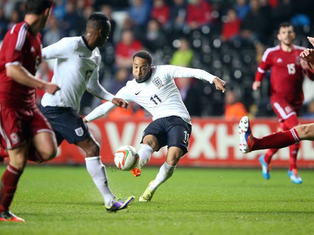 Redmond curls home his hat-trick