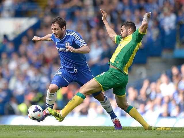 Frank Lampard and Bradley Johnson battle for the ball