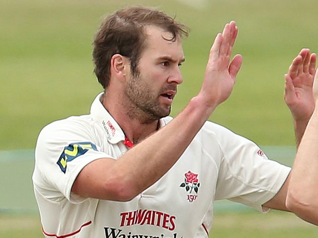 Tom Smith guided Lancashire to tense victory