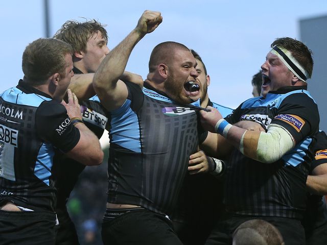 Gordon Reid of Glasgow Warrior reacts after scoring a try