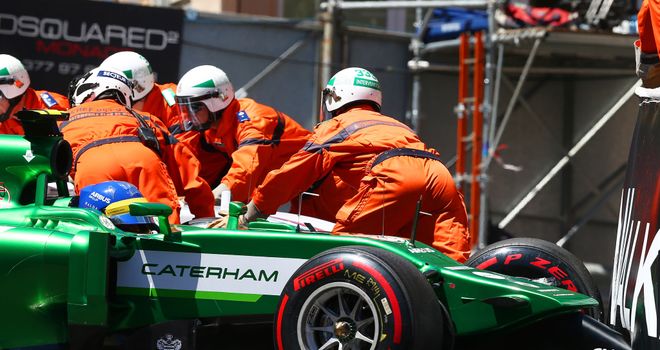 Marcus Ericsson in the barrier following a collision with Felipe Massa
