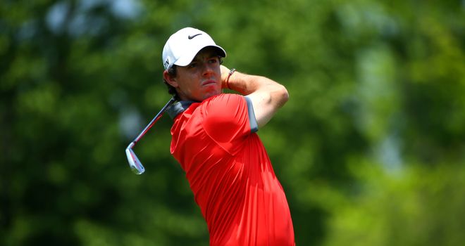 Rory McIlroy: Holds three shot lead despite a double-bogey at the 14th hole