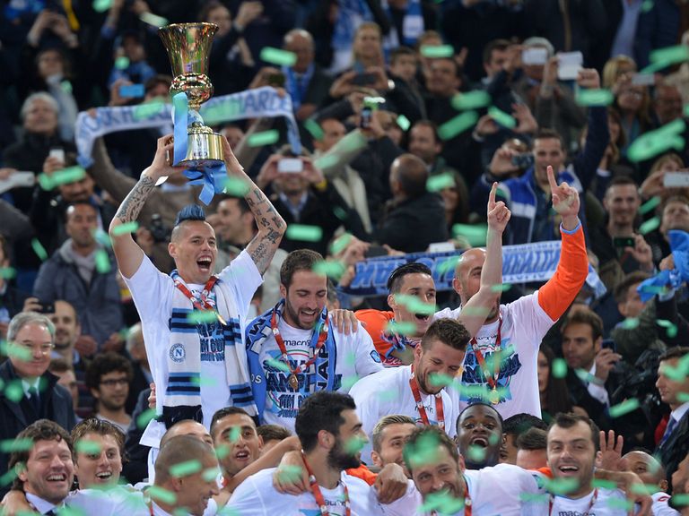 Napoli's Slovakian midfielder Marek Hamsik holds aloft the Coppa Italia