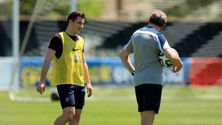 Leighton Baines and Roy Hodgson during England training