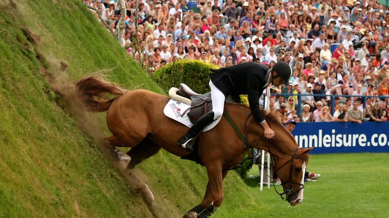 Jan Motmans riding Quick Chin Van de Elsenidam stuggles to hang on as he comes down the Derby Bank