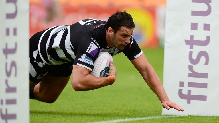 Danny Galea dives over for a Widnes try