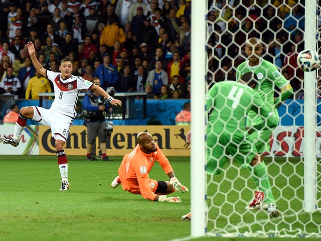 Mesut Ozil scores for Germany