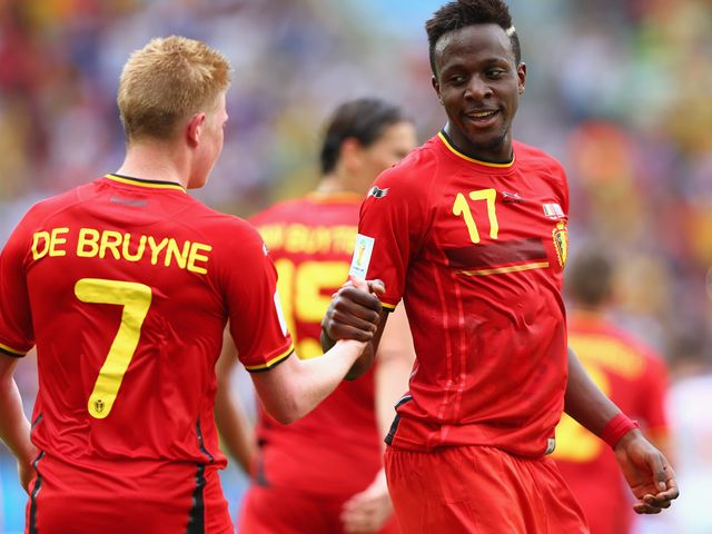 Divock Origi (right) was the hero as Belgium booked their place in the last 16 