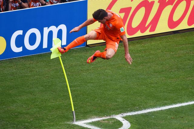 Klaas-Jan Huntelaar celebrates after scoring a penalty deep into added time