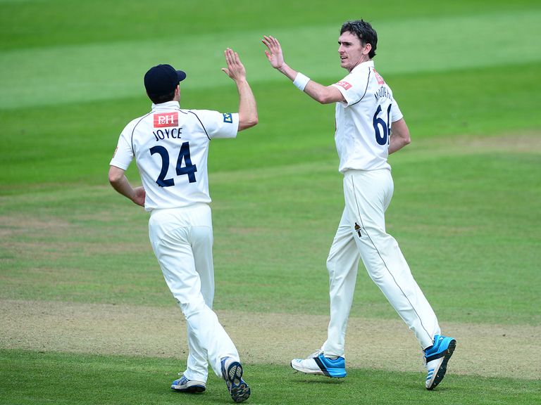 Steve Magoffin of Sussex (right) celebrates with Ed Joyce after taking the wicket of Peter Trego
