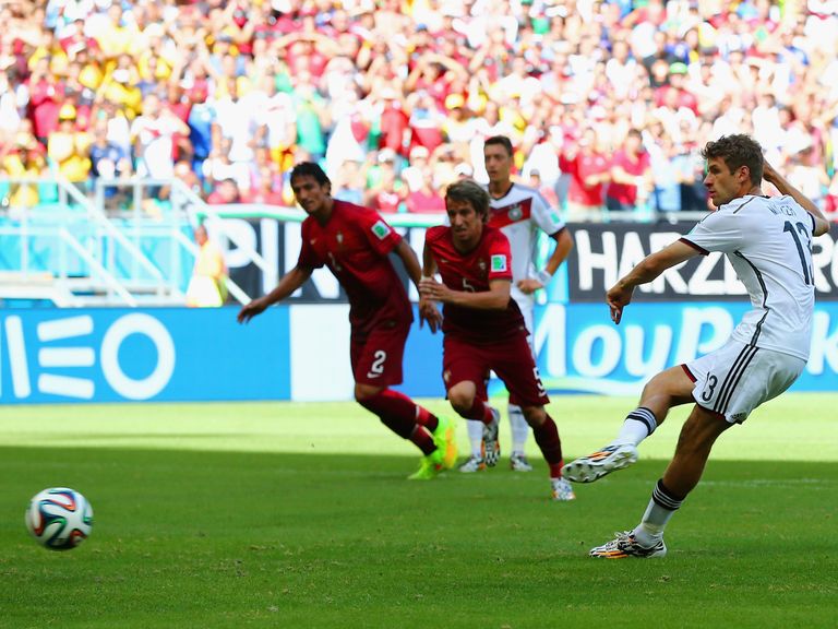 Thomas Muller scores his first goal against Portugal from the spot