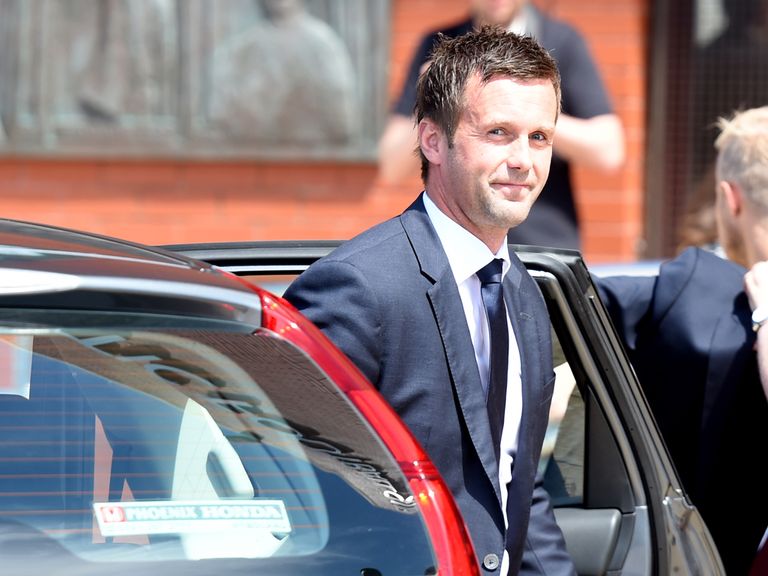 New manager Ronny Deila makes his way into Celtic Park.