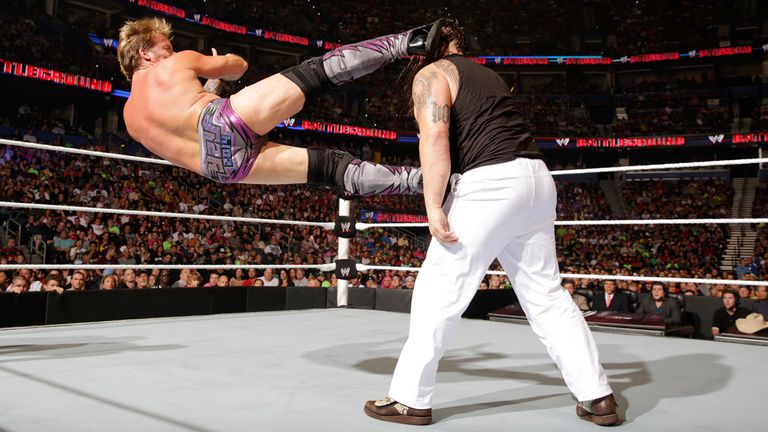 Chris Jericho boots Bray Wyatt in the back of the head