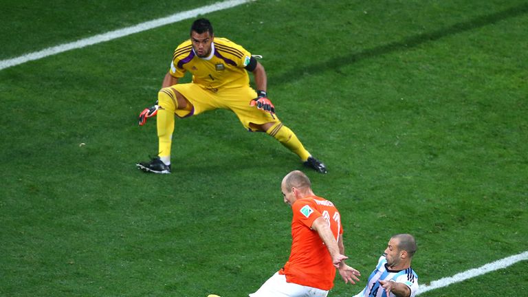 Javier Mascherano: Slides in on Arjen Robben in their World Cup semi-final