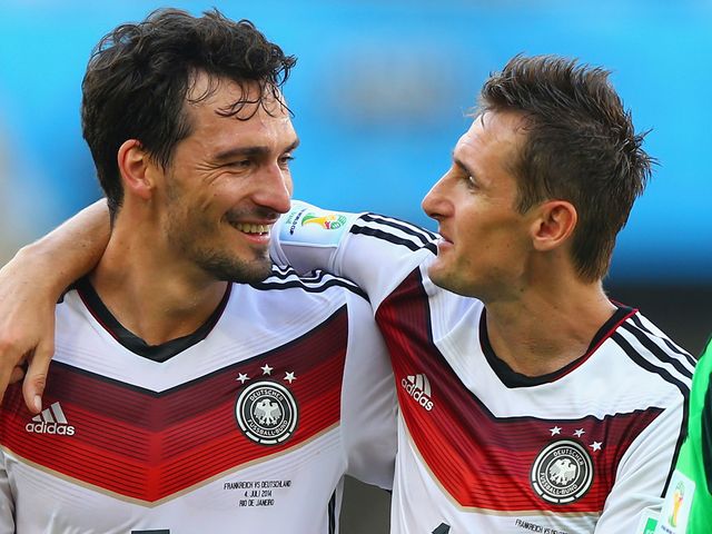 Mats Hummels (left) and Miroslav Klose celebrate after making it to the World Cup semi-finals