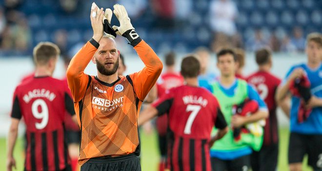 St Johnstone goalkeeper Alan Mannus applauds the fans at full-time