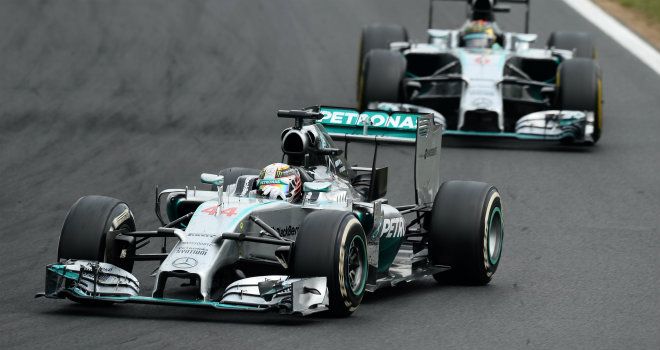 Lewis Hamilton and Nico Rosberg battle in the Hungarian GP