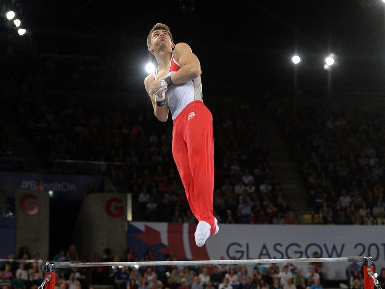 England's Max Whitlock dismounts from the high bar