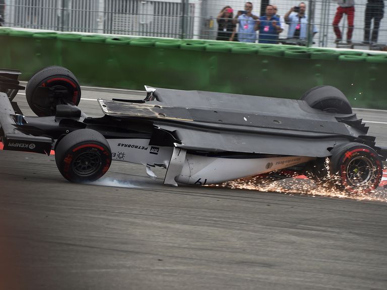 Felipe Massa crashes and rolls at the start of the German Grand Prix