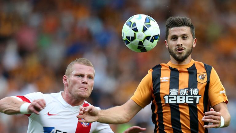 Shane Long battles with Peter Cogley