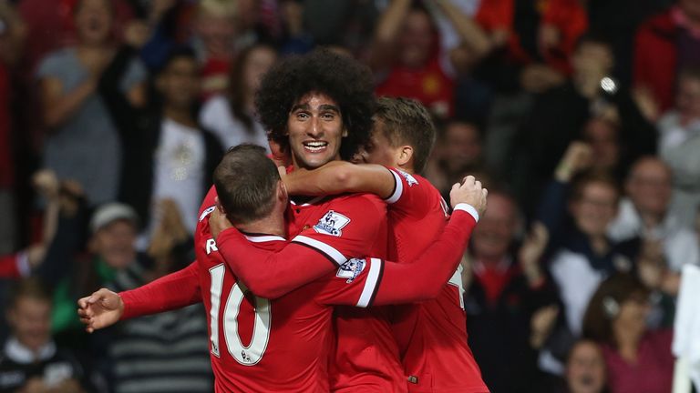 Marouane Fellaini celebrates late winner