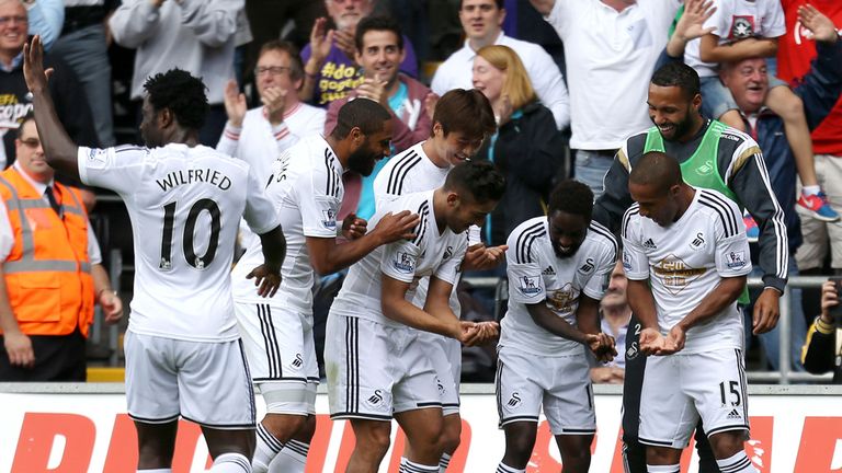 Dyer: 'New dad' celebration with Swansea team-mates
