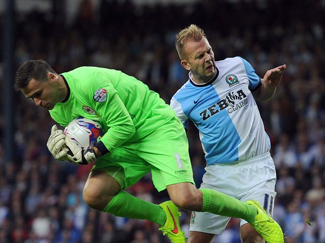 David Marshall gets to the ball before Jordan Rhodes