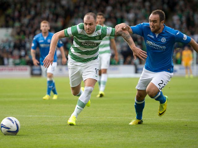 Anthony Stokes is tracked by St Johnstone's Lee Croft