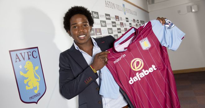 New signing Carlos Sanchez of Aston Villa poses for a picture at the club's training ground at Bodymoor Heath
