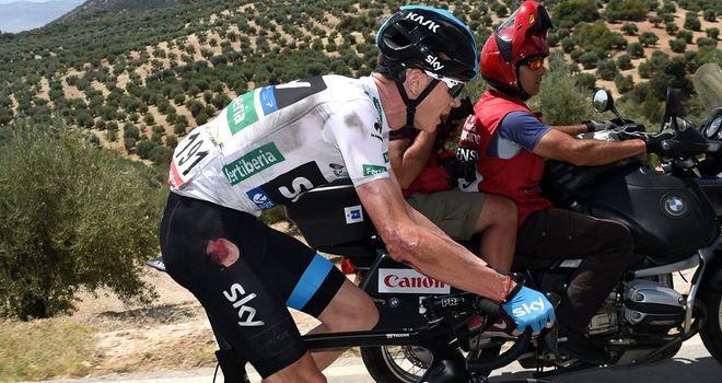 Chris Froome suffered cuts to his arm, hip and knee in the crash