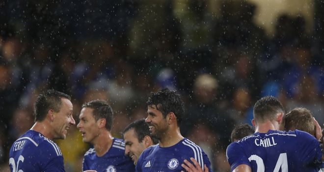 Diego Costa: Celebrates his second goal with his team-mates