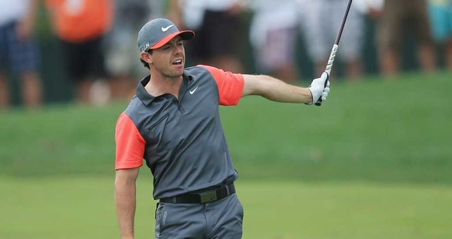 Rory McIlroy: Hooks his second shot out of bounds on the 10th