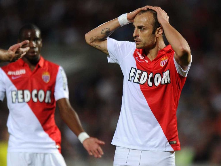 Forward Dimitar Berbatov reacts after Monaco's hammering on Sunday