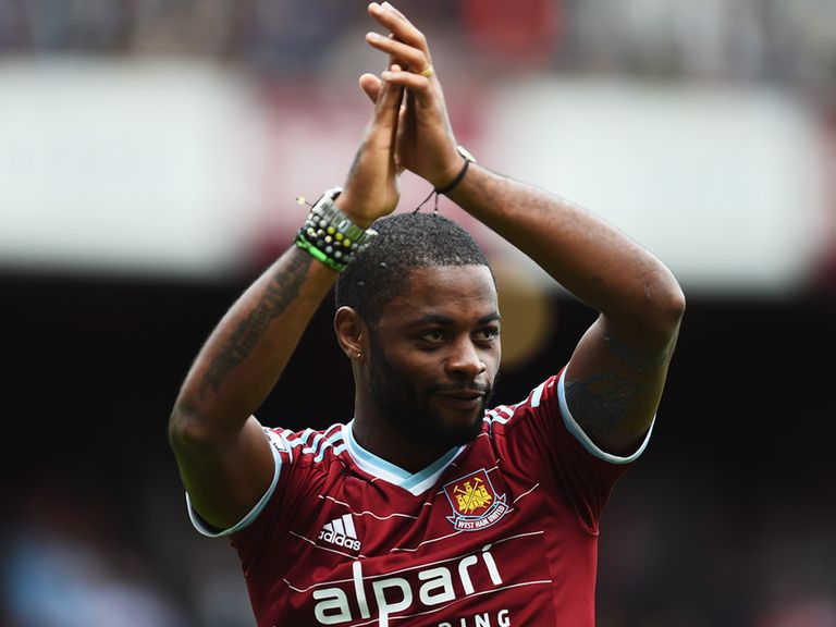 Alex Song of West Ham United applauds the fans as he joins the club on loan