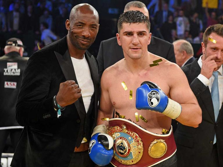 Marco Huck celebrates with Johnny Nelson after his win