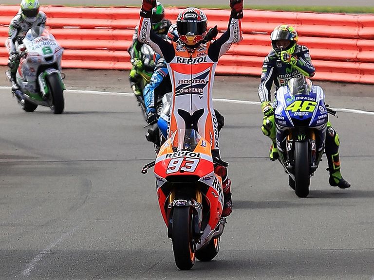 Marc Marquez celebrates his victory at Silverstone