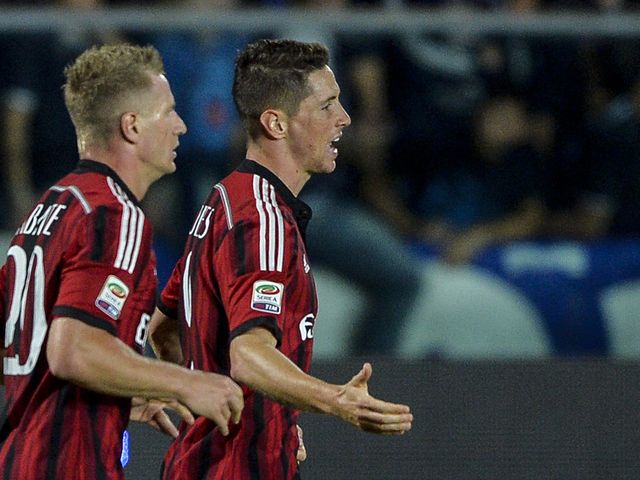 AC Milan's forward Fernando Torres celebrates after scoring