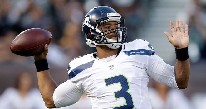 Seattle's Russell Wilson in action against the Oakland Raiders at O.co Coliseum