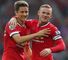Ander Herrera celebrates with Wayne Rooney after scoring United's second.