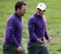 Graeme McDowell (left) wishes Rory McIlroy (right) a speedy recovery