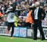 Papiss Cisse celebrates with Alan Pardew