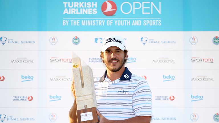 Koepka poses with the trophy after securing victory in the 2014 Turkish Airlines Open