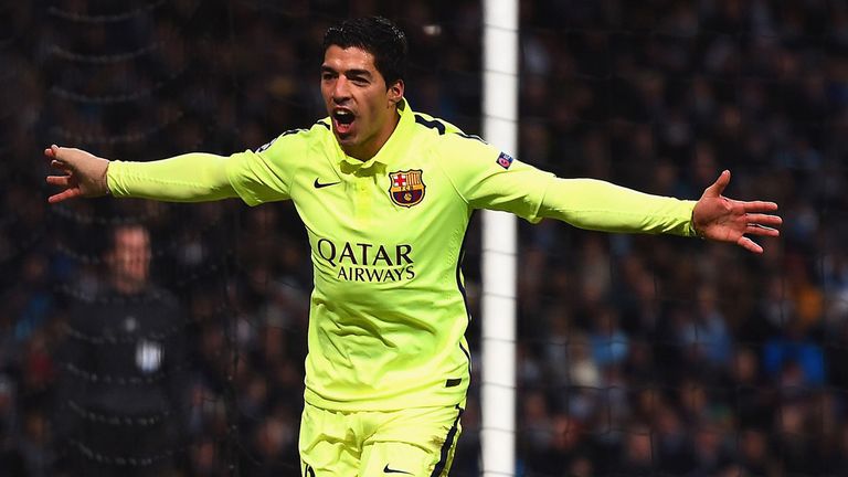 Luis Suarez celebrates scoring against City in the first leg