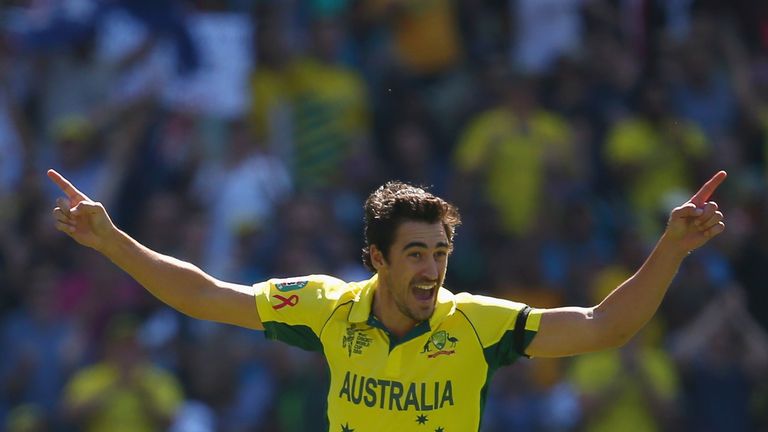 Mitchell Starc celebrates taking the wicket of Brendon McCullum in the World Cup final