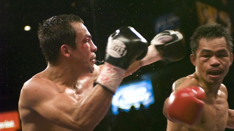 Garcia has joined old rivals Marquez and Pacquiao in the history books
