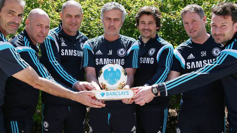 Chelsea manager Jose Mourinho celebrates winning the Barclays Manager of the Season Award with his back room team from Stamford Bridge