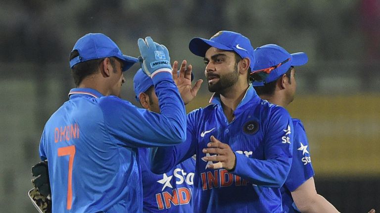 Vrat Kohli (R) looks the man most likely to take over from Dhoni (L)