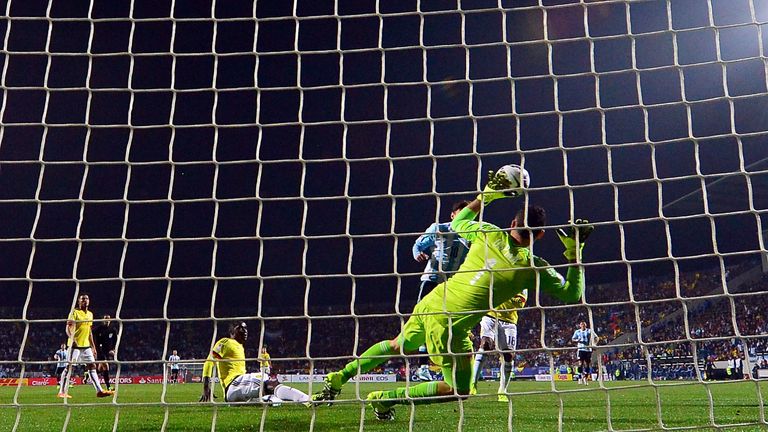 Argentina's forward Lionel Messi is denied a goal by Colombia's goalkeeper David Ospina