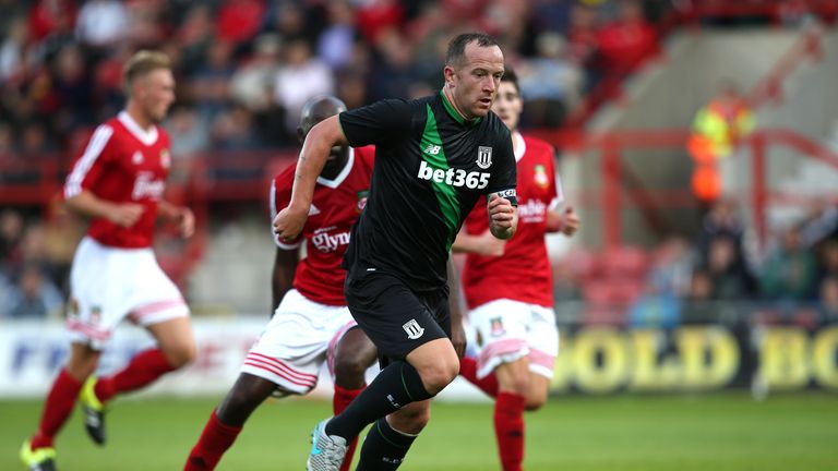 Charlie Adam (front) misses Stoke's FA Cup tie with a calf injury