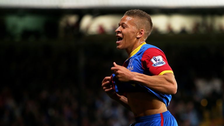 Dwight Gayle celebrates after scoring Palace's third goal to level the scores at 3-3 against Liverpool